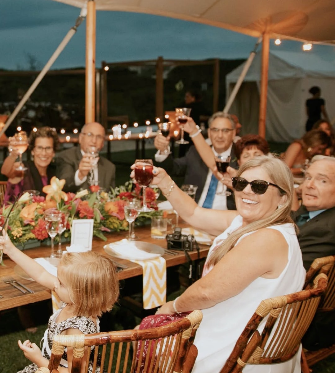 Family eating dinner at a large Table